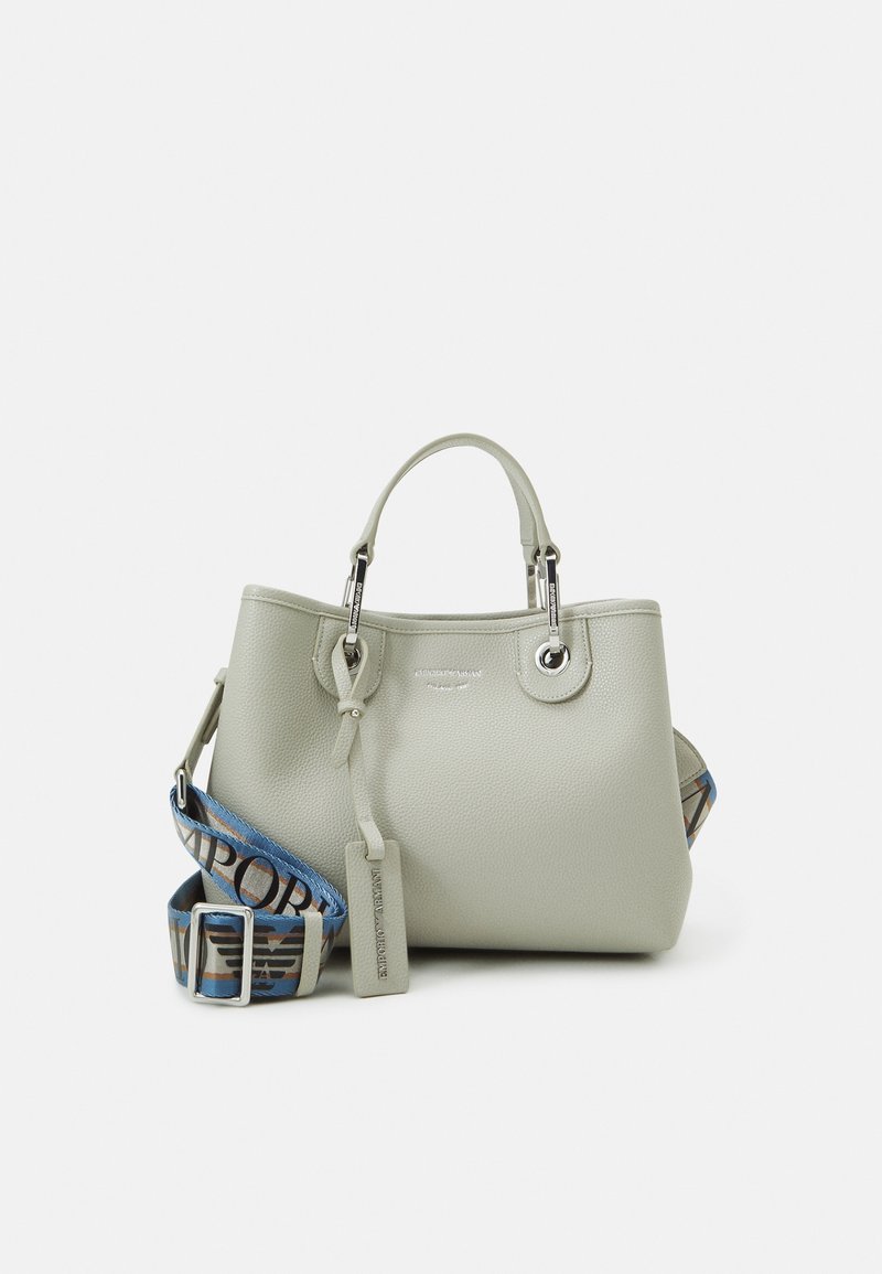 Light gray structured handbag with pebbled texture, dual top handles, and detachable patterned strap featuring blue and brown accents.