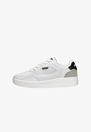 White sneakers featuring a smooth leather upper, lace closure, grey and black accent on the heel, and a thick rubber sole.