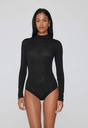 Czarny bodysuit z długim rękawem, wykonany z teksturowanej tkaniny, z designem typu golf i wysokim krojem nóg, z delikatnymi plamkami w całej powierzchni.