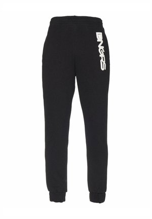 Black sweatpants made of soft fabric with a tapered leg design. Features white branding on the left side and elastic cuffs at the ankles.