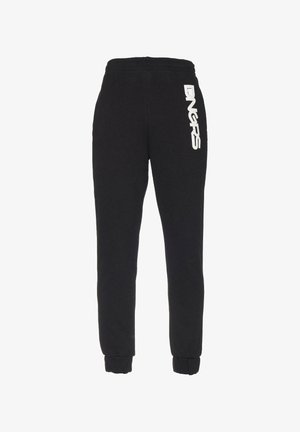 Mustad mustadest kangast dressipüksid kitseneva jala disainiga. Omab valget brändingut vasakul küljel ja elastseid mansette pahkluude juures.