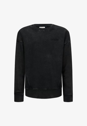 Felpa nera con colletto rotondo e maniche lunghe, con il logo discreto "RETOUR JEANS" sul lato sinistro del petto.