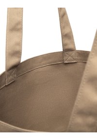 Világosbarna vászontáska, erős anyagból, dupla szövetfüllel és megerősített varrással a felső szélen. Belső nézet.