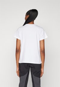 Helly Hansen HH LOGO
 - Triko s potiskem - white