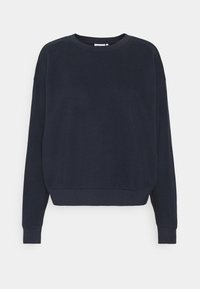 Felpa blu navy con collo rotondo, maniche lunghe e orlo aderente. Realizzata in morbido tessuto di cotone con una texture liscia.