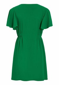 Robe courte verte avec manches volantées et taille élastique froncée, vue de dos sur fond blanc.