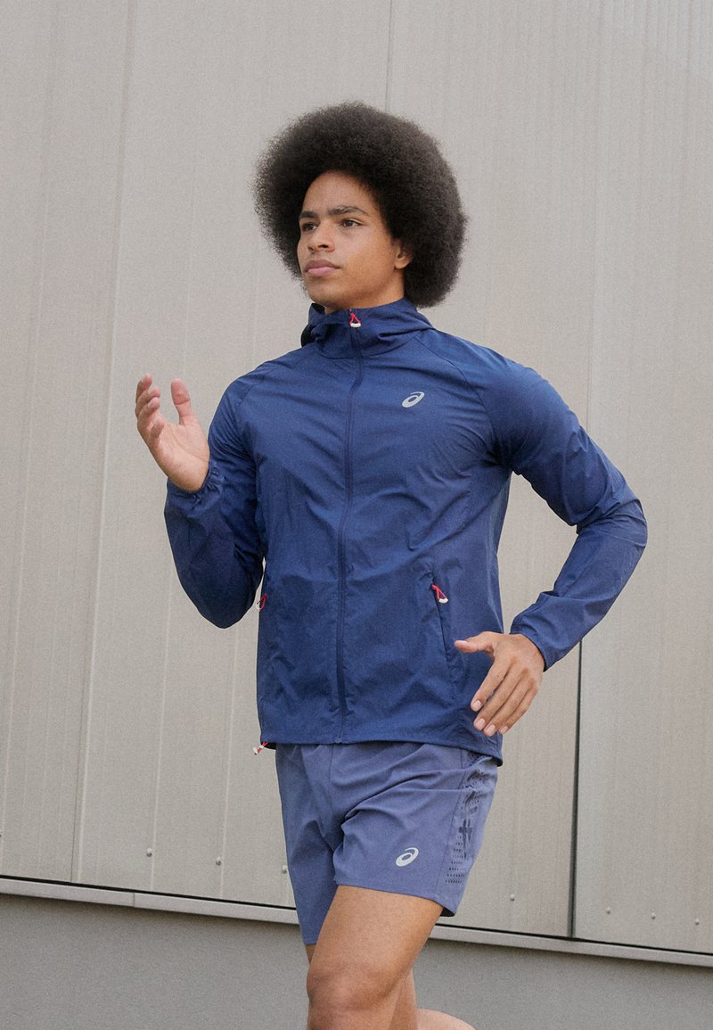ASICS ROAD PACKABLE JACKET - Veste coupe-vent - blue expanse