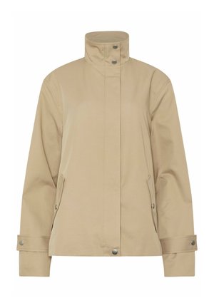 Veste beige à col montant, boutons-pression à l'avant, manches longues, poignets réglables à pression et deux poches latérales avec fermetures à pression.