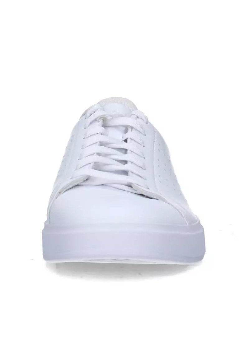 White sneaker with a smooth synthetic upper, round toe, perforated sides, and flat white rubber sole. Features white laces and minimal design.