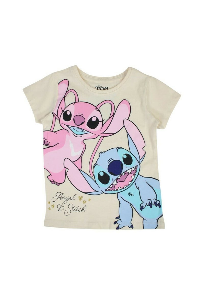 T-shirt en coton crème présentant un imprimé graphique de personnages de dessin animé roses et bleus avec des oreilles surdimensionnées, étiqueté "Angel & Stitch".