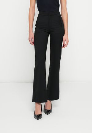 ROMISE - Pantalones - black
