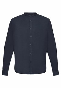 Lange mouwen knoopshirt van donkerblauwe stof. Kenmerkend is de bandkraag, de knoopsluiting aan de voorkant en de rechte zoom met omgeslagen manchetten.
