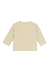 Koszula z długim rękawem w jasnym beżu z bawełny. Posiada okrągły dekolt i wykończone mankiety. Gładka tekstura bez widocznych wzorów czy detali.