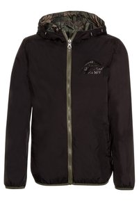 Black hooded jacket with a zip closure, featuring a camouflage inner lining and a textured logo on the chest. Elastic cuffs and hem.