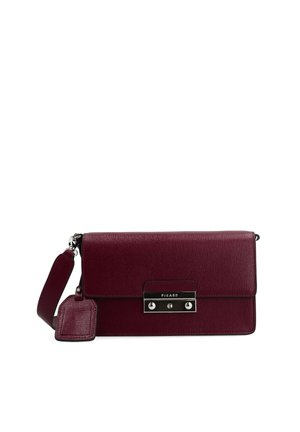 Burgundy leather handbag with textured finish, silver hardware, rectangular shape, flap closure, and detachable shoulder strap. Brand tag attached.