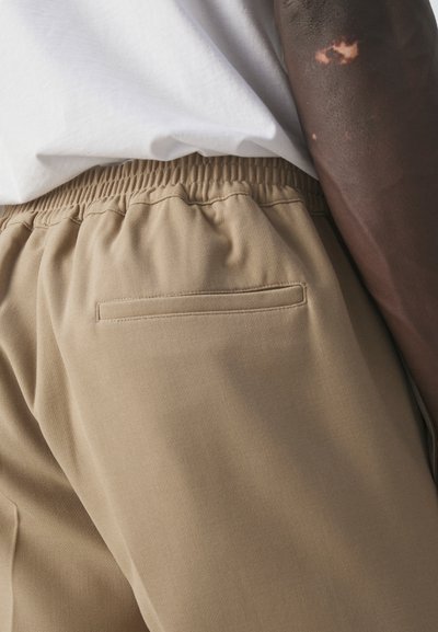 sandro Hlače za odijelo - beige