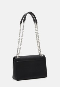 Black leather handbag with a structured rectangular shape, featuring dual black leather straps and silver chain accents. Smooth texture.