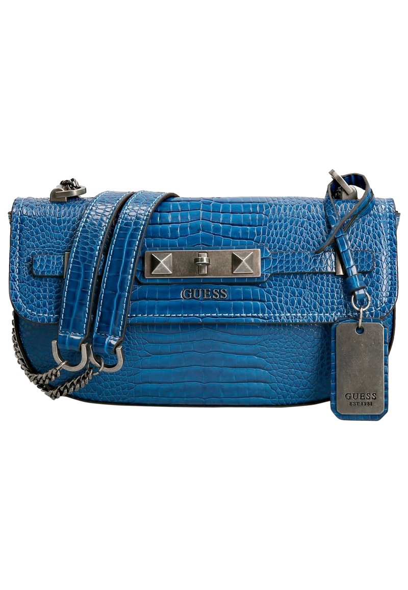 Blauwe croco-embossed handtas met zilverkleurige hardware, dubbele hengsels en een label. Heeft een klep sluiting en een textuurafwerking.