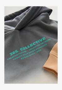 Unselected, tie dye slogan