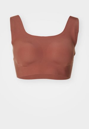 Bruine naadloze bralette met een vierkante halslijn, brede banden en een gladde, rekbare textuur. Geen zichtbare sluitingen of naden.