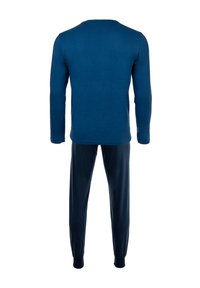 Marineblauwe langemouwshirt met een ronde halslijn, gecombineerd met bijpassende broek met elastische manchetten en een zachte, gladde textuur.