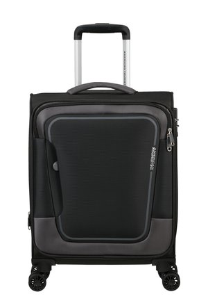 Black and gray soft-shell suitcase with a textured finish, retractable handle, and four black wheels; features a large front zip pocket.