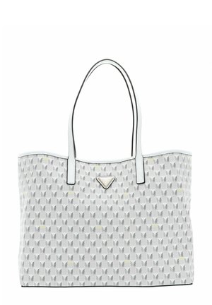 Borsa tote bianca con un design a motivo geometrico, caratterizzata da accenti neri, due manici robusti e un logo triangolare argentato sulla parte frontale.