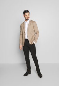 Selected Homme SLHSLIM-CARLO FLEX PANTS - Calças - black