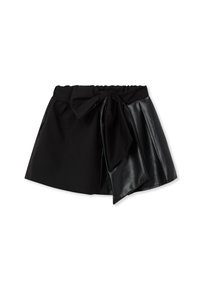 Mini gonna nera con pannello in pelle asimmetrico su un lato e un grande fiocco di tessuto legato in vita.
