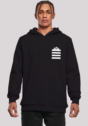 Black hoodie made of soft fabric, featuring a front kangaroo pocket and a small white striped design with an accent at the chest.