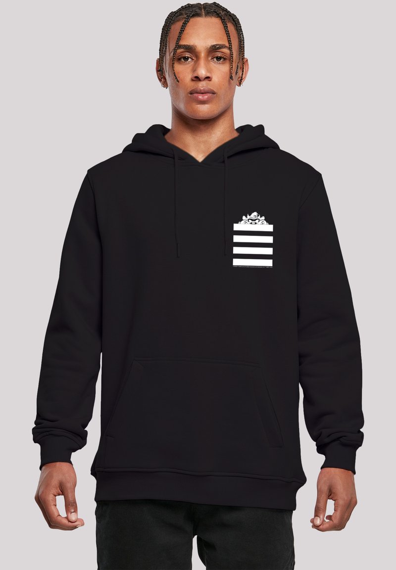 Black hoodie made of soft fabric, featuring a front kangaroo pocket and a small white striped design with an accent at the chest.