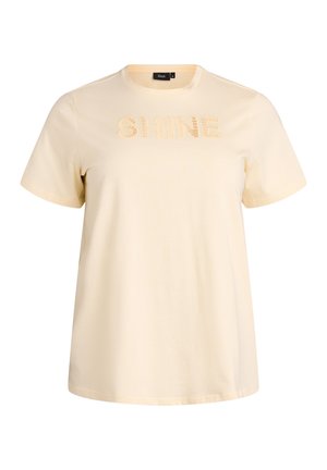 Jasnokremowy t-shirt z bawełny, z krótkimi rękawami. Na przodzie znajduje się teksturowany napis "SHINE" w pasującym kolorze.
