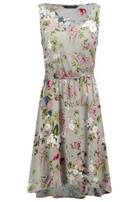 Robe sans manches longueur genou avec un fond gris clair et un imprimé floral multicolore, avec une taille élastique et un col rond.