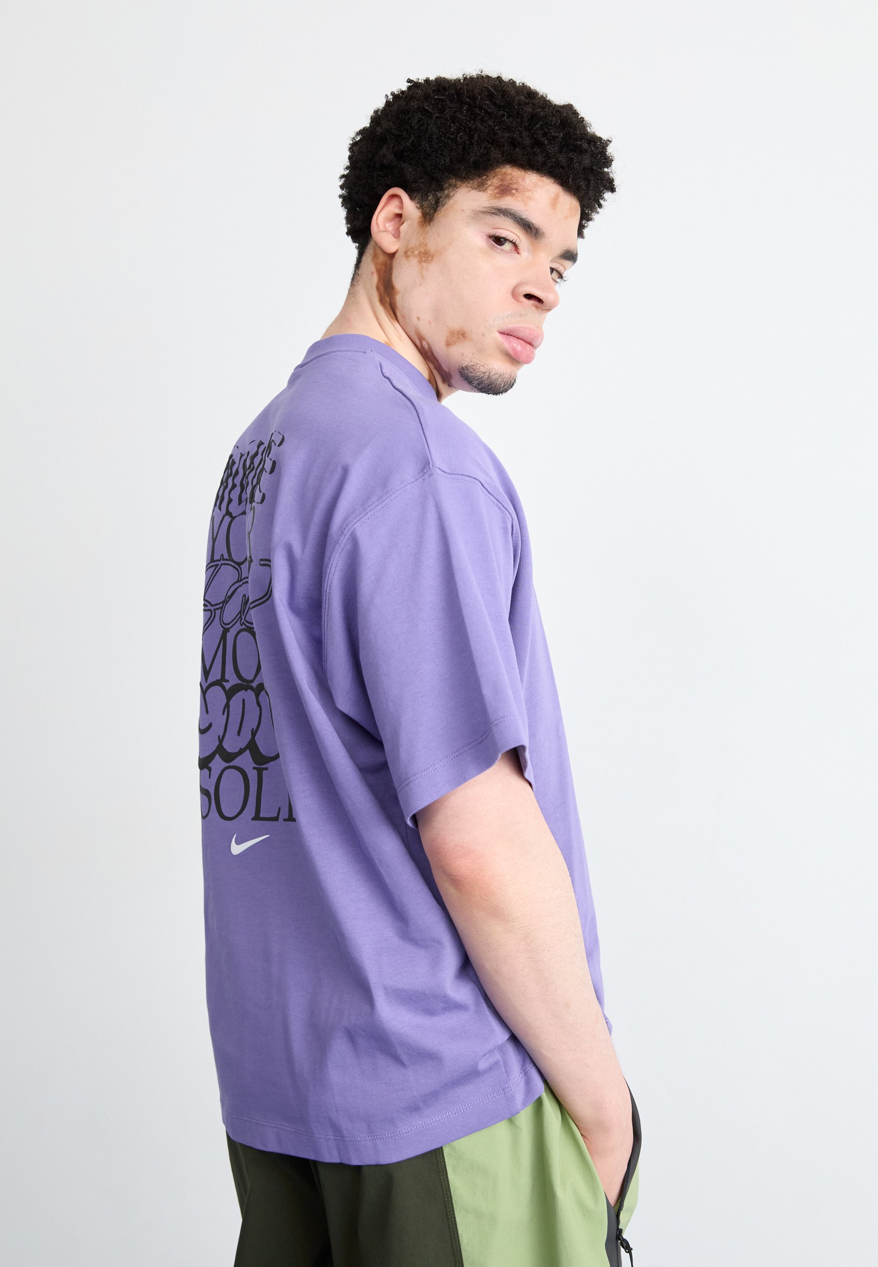 purple teal nike shirt