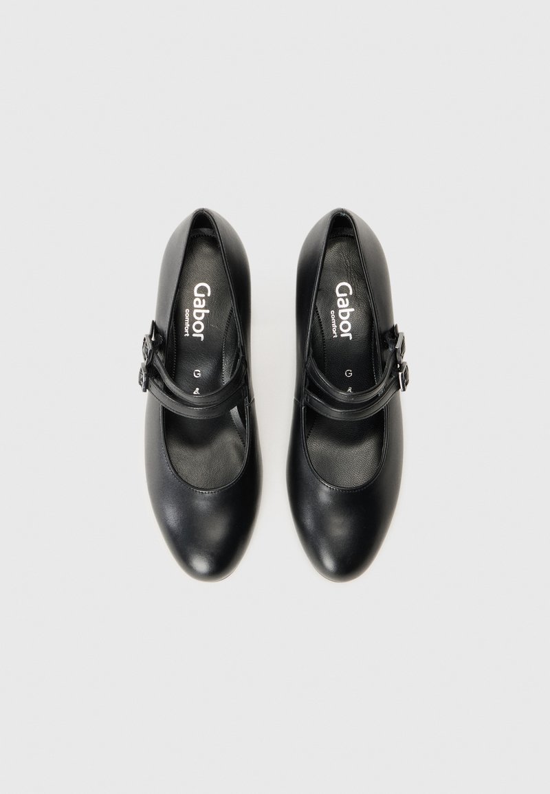 Scarpe Mary Jane in pelle nera con doppi cinturini a fibbia, marchiate "Gabor comfort," viste dall'alto su uno sfondo bianco.