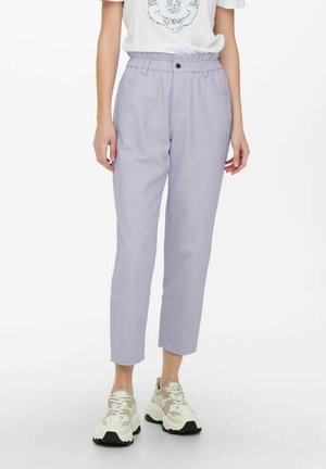 Light purple denim pants with a high waist, straight leg, and slight tapering at the ankle. Worn with a casual white graphic t-shirt and sneakers.