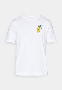 White cotton t-shirt with short sleeves, featuring a small yellow badge design with "NY" and a green accent on the left chest.