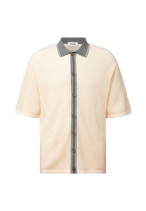 Kortermet strikket poloshirt i kremfarge med grå knappestolpe og krage, teksturert stoff og seks knapper foran.