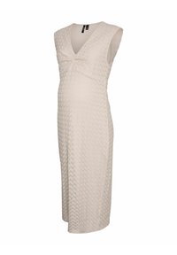 Robe de maternité en tricot, couleur crème, sans manches, design en V, corsage ajusté avec un détail froncé sous la poitrine, longueur genou, tissu texturé.