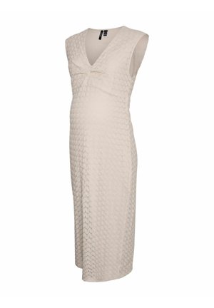 Abito da maternità a maglia, di colore crema, senza maniche, design a V, corpino aderente con dettagli arricciati sotto il busto, lunghezza ginocchio, tessuto testurizzato.