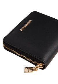 Black leather zippered wallet with gold metal zipper and hardware. Features a shiny embossed logo on the front and a smooth texture.