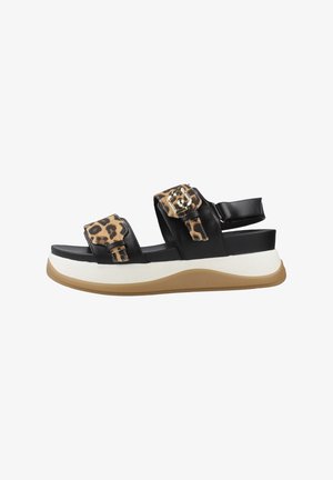 Sandalo platform nero con suola bianca e beige, cinturini con stampa leopardata e fibbia dorata regolabile nella zona della caviglia e delle dita.
