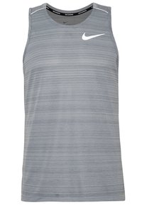 Grey athletic tank top with horizontal stripes, round neckline, and Nike logo in white on the chest. Soft fabric with a lightweight texture.