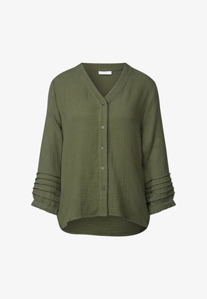 Grøn, struktureret skjorte med V-hals, trekvartærmer og plisserede detaljer ved manchetterne. Buet kant og blødt materiale.