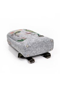 Gray felt backpack with colorful embroidered designs, rectangular shape, metal accents, adjustable black straps, and a front zipper pocket.