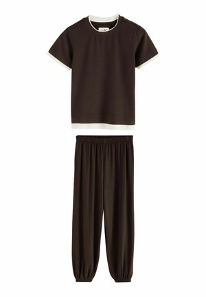 Dark brown short-sleeve shirt with white trim and matching dark brown elastic-waist pants with elastic cuffs.