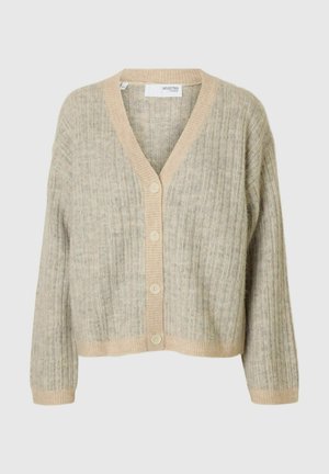 Beige ribbad cardigan med V-hals, med knaplukning foran og lange ærmer. Teksturen er blød, med kontrastkant rundt kanterne.
