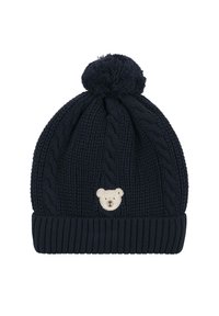 Granatowa dziana czapka beanie z wzorem w warkocze, z prążkowanym brzegiem i puszystym pomponem na górze. Na przodzie wyszyta jest kremowa twarz misia.