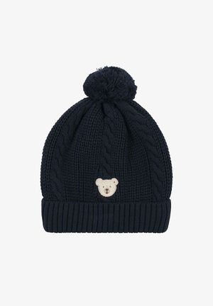 Berretto lavorato a maglia blu navy con motivo a trecce, orlo a coste e un morbido pompon sulla cima. Presenta un viso di orsetto crema ricamato sul davanti.