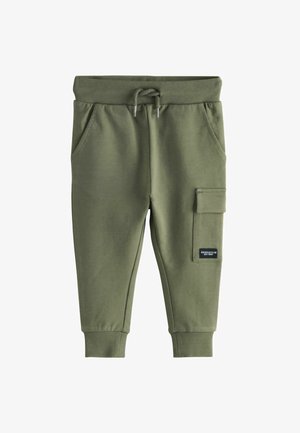 Oliven grøn joggerbukser lavet af blødt stof, med en elastisk talje med snor, to sidelommer og en lomme på benet.